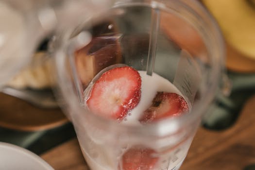 personal blender with smoothie ingredients