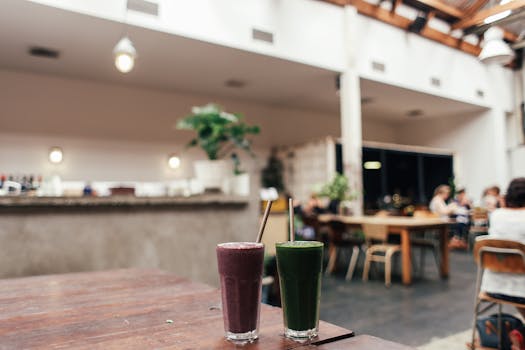 a vibrant green smoothie in a glass