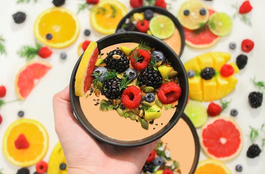 colorful smoothie bowl topped with fruits