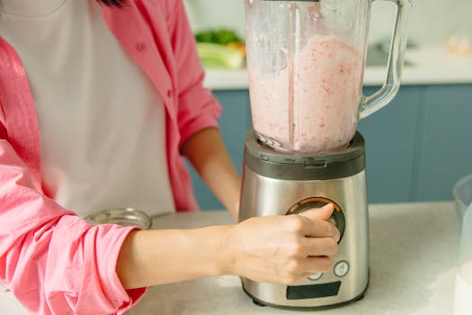 smoothie preparation with fresh fruits