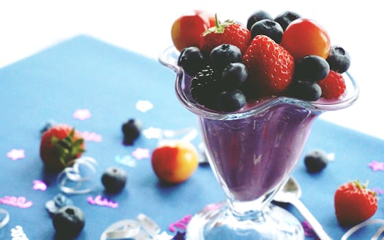 colorful smoothie with berries and spinach