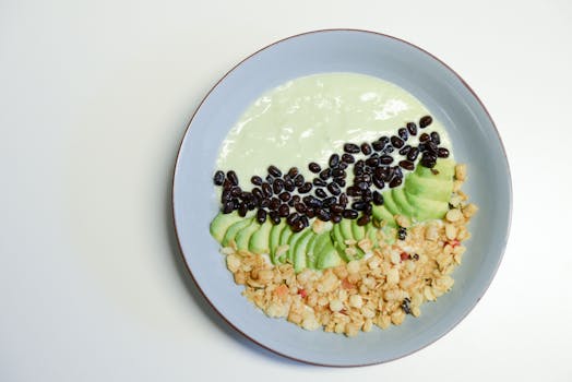 colorful smoothie with berries and avocado