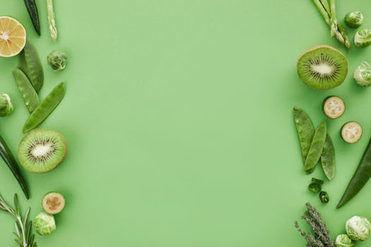 a green smoothie filled with vegetables and fruits